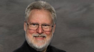 In memoriam Reverendo Thomas Baima